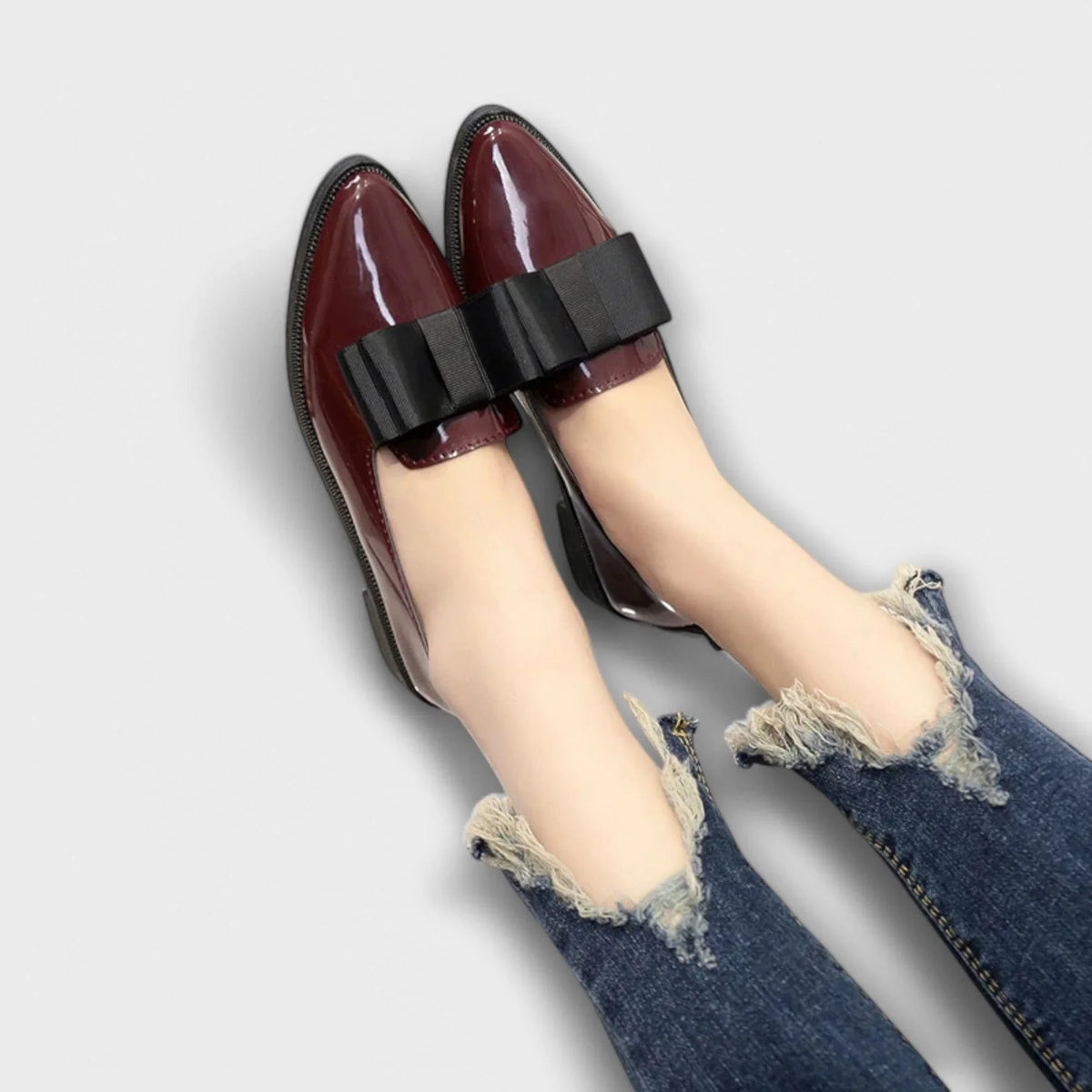 Women's faux leather loafers with bow detail