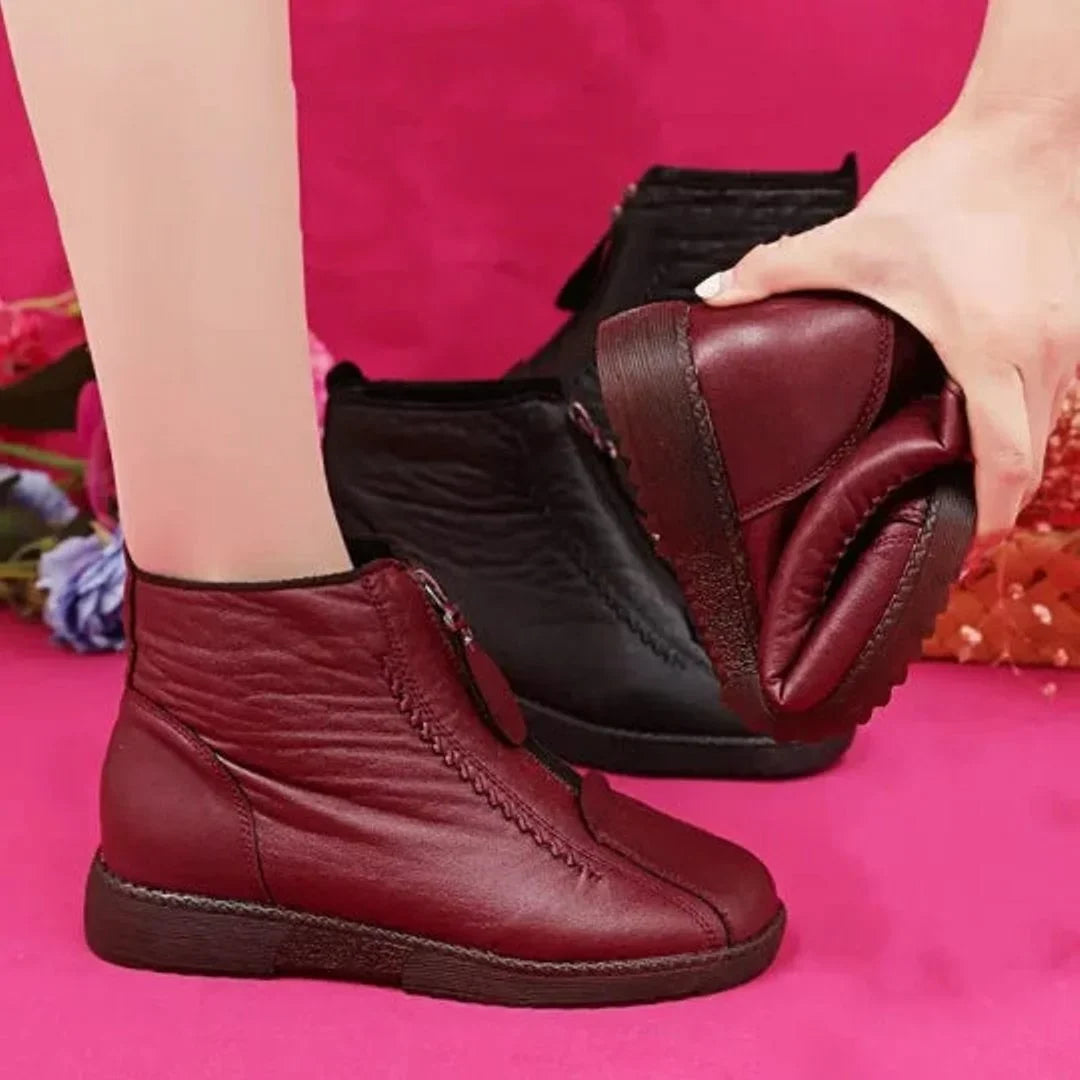 Women's fleece-lined leather ankle boots with zip closure