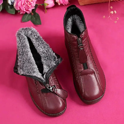 Women's fleece-lined leather ankle boots with zip closure