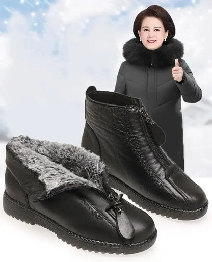 Women's fleece-lined leather ankle boots with zip closure