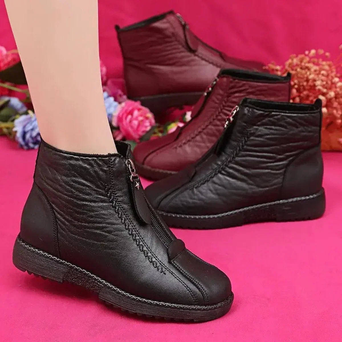Women's fleece-lined leather ankle boots with zip closure