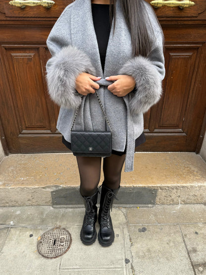 Women's faux-fur trimmed winter coat with flattering silhouette