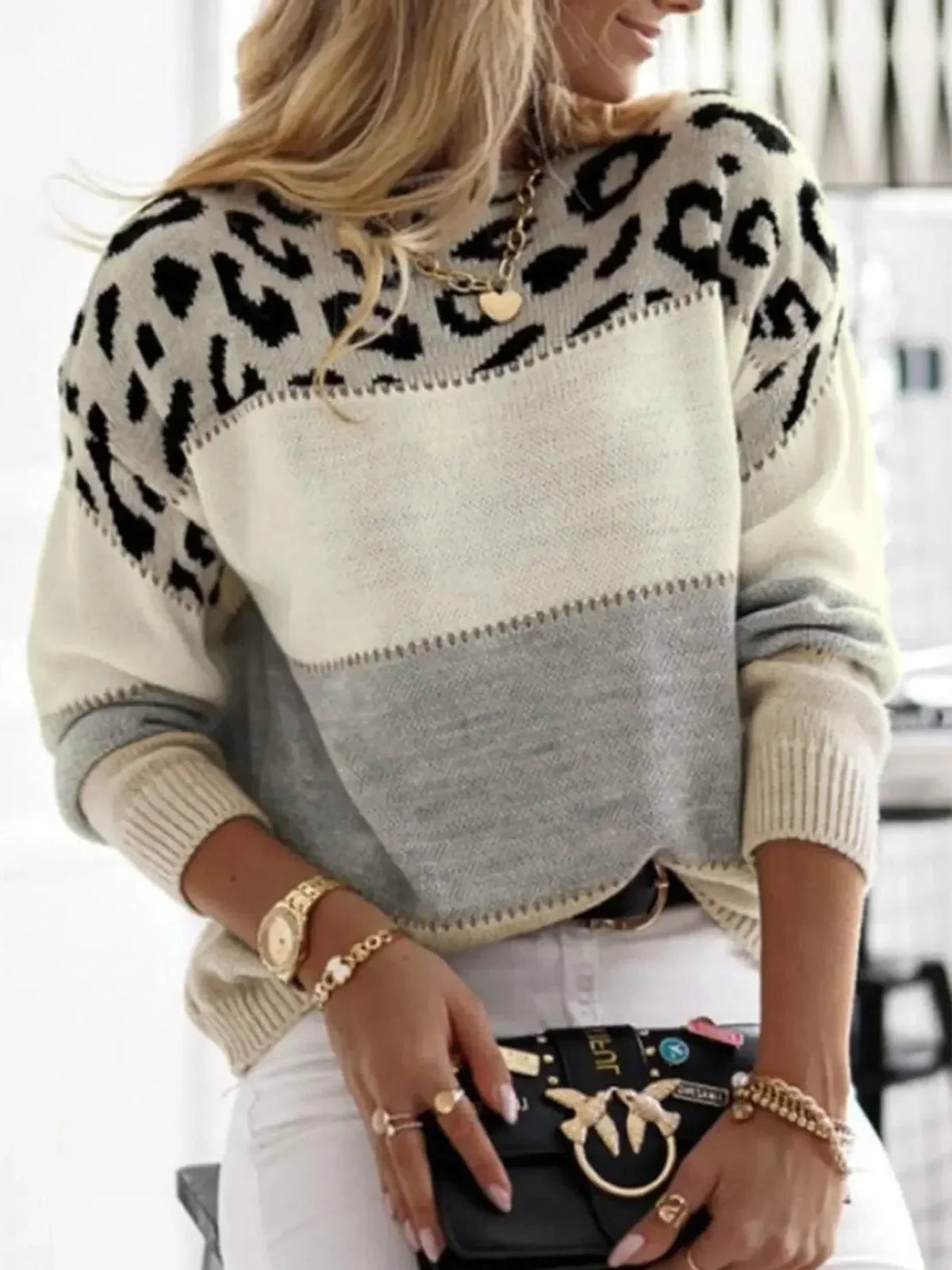 Women's crew neck sweater with leopard print yoke detail