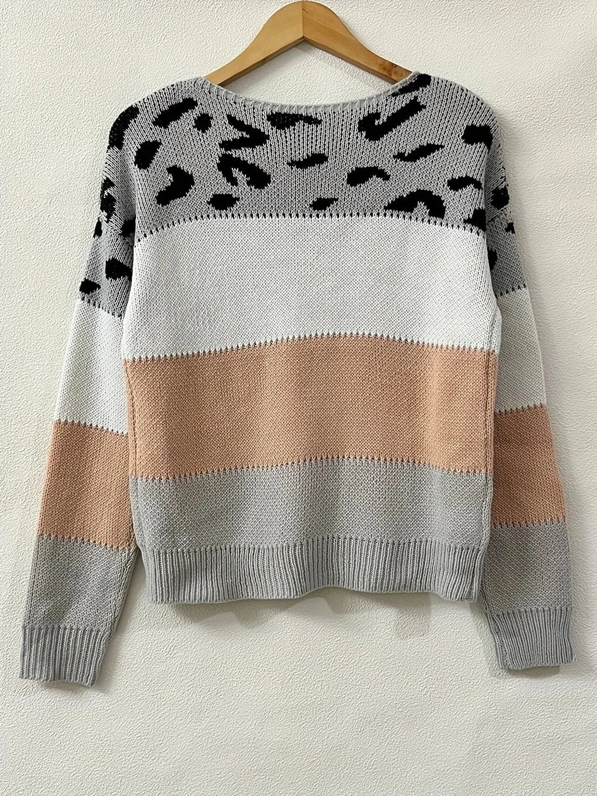 Women's crew neck sweater with leopard print yoke detail