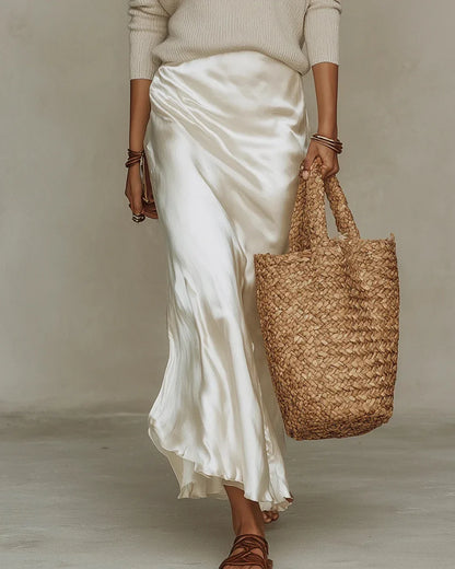 Women's ribbed knit sweater and satin wrap skirt two-piece set