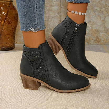 Women's supportive ankle boots with laser-cut detailing