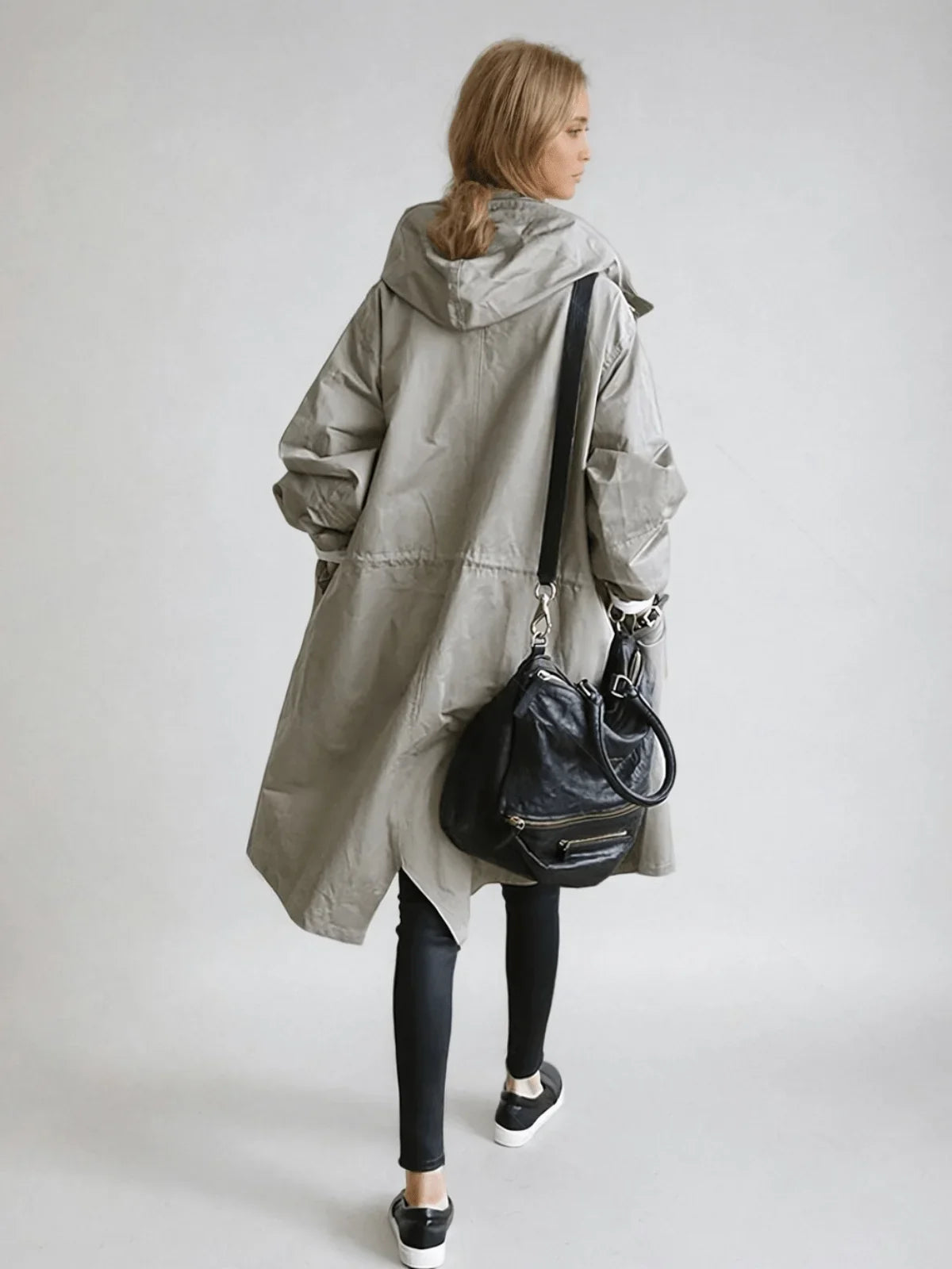 Women's oversized button-down trench coat with relaxed fit