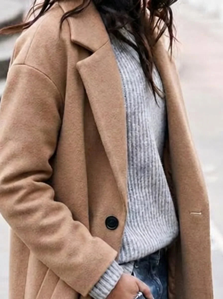 Women's oversized button-up trench coat with lapel collar