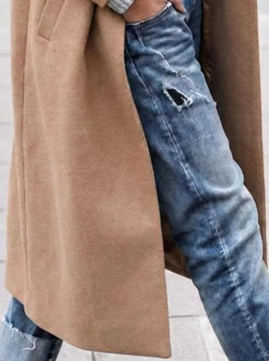 Women's oversized button-up trench coat with lapel collar