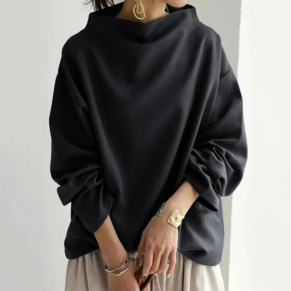 Women's oversized roll-neck knit sweater with relaxed fit