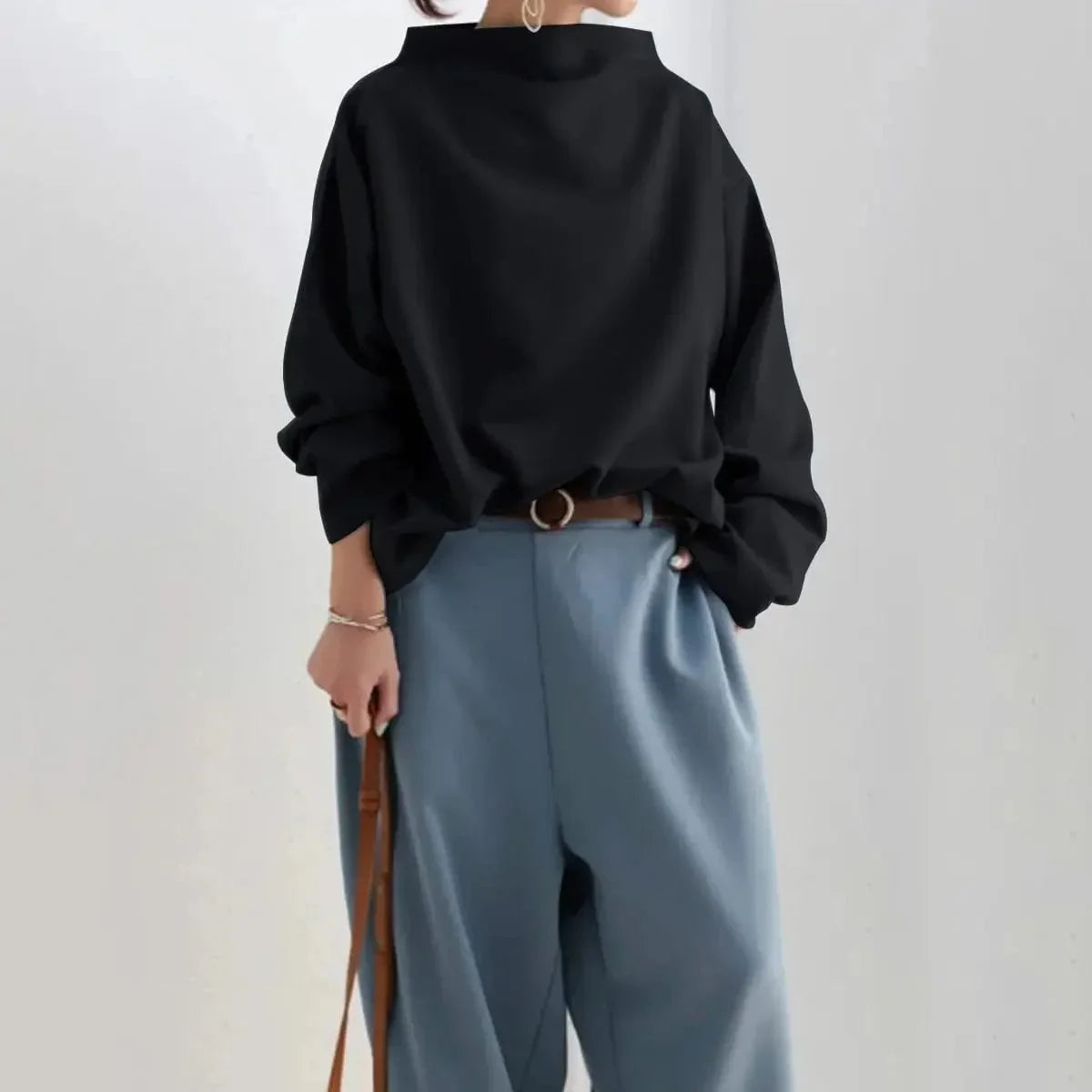 Women's oversized roll-neck knit sweater with relaxed fit