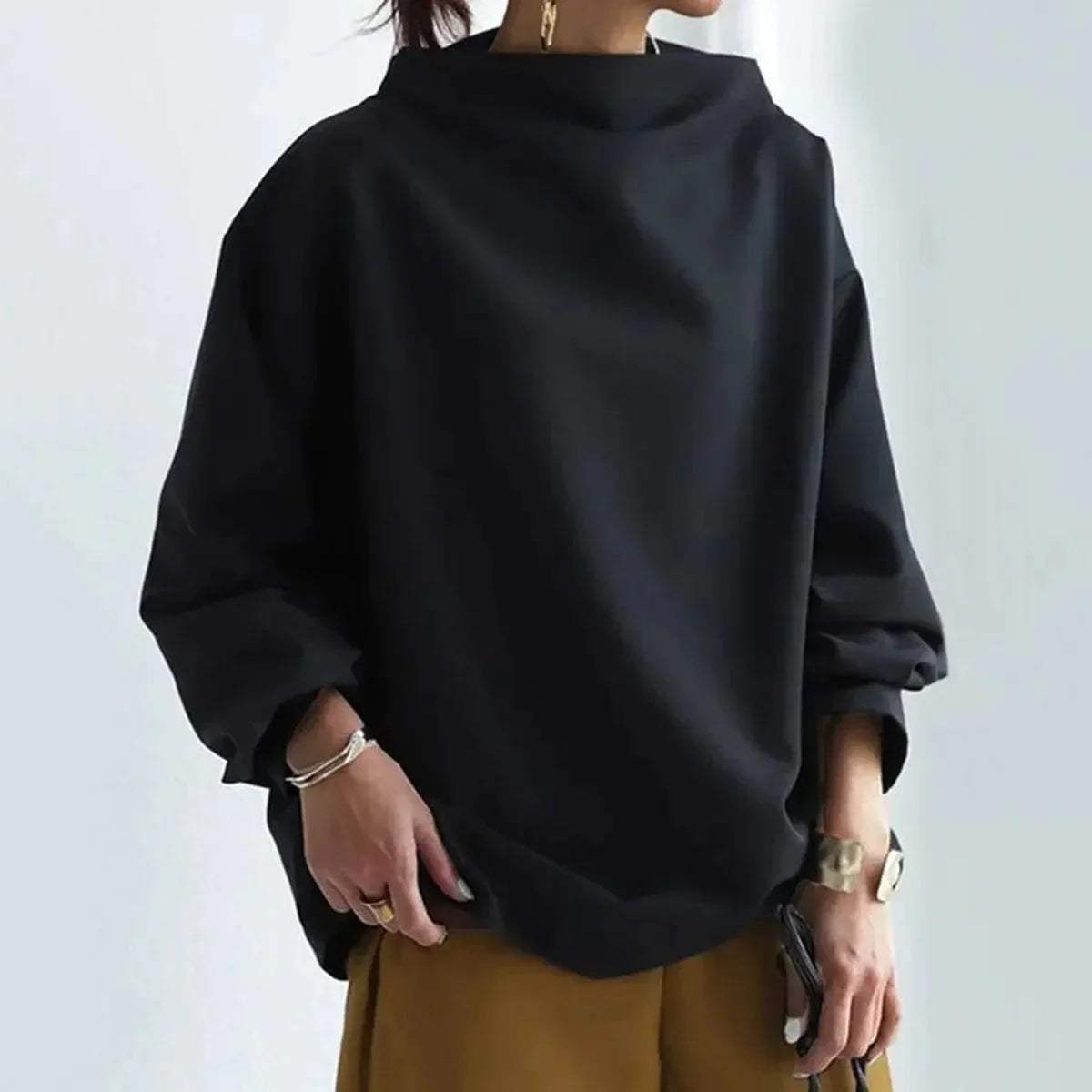 Women's oversized roll-neck knit sweater with relaxed fit