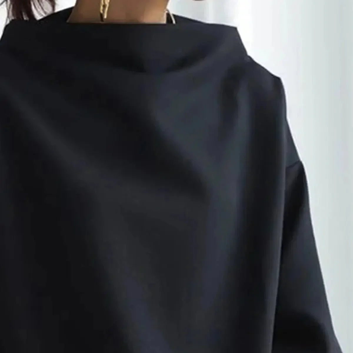 Women's oversized roll-neck knit sweater with relaxed fit