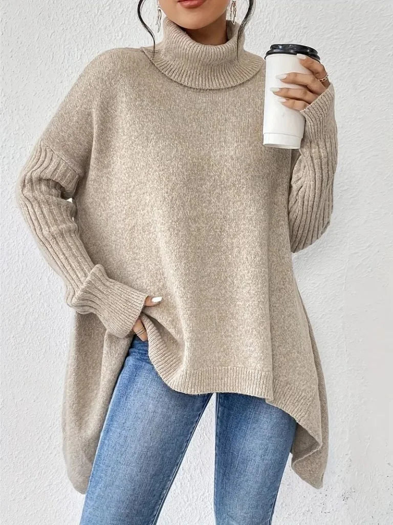 Women's oversized turtleneck sweater with asymmetrical hem