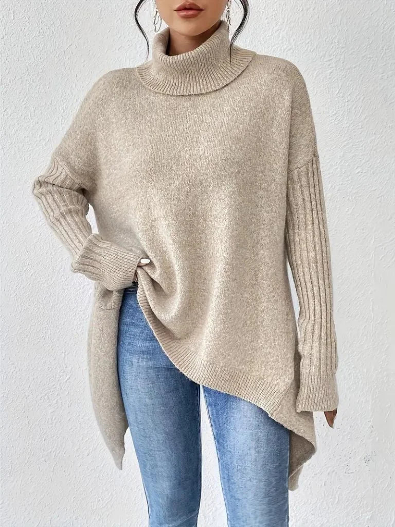 Women's oversized turtleneck sweater with asymmetrical hem