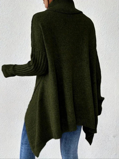 Women's oversized turtleneck sweater with asymmetrical hem