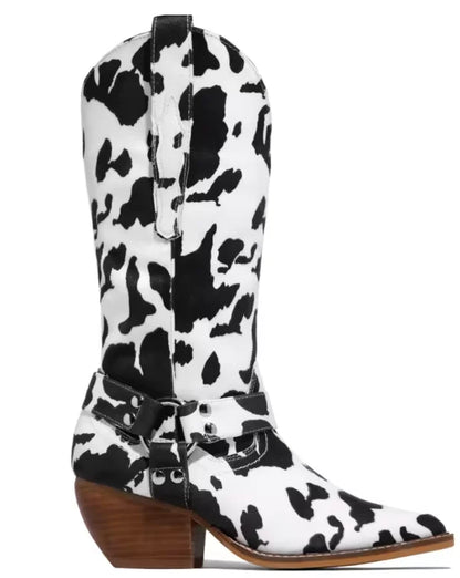 Women's cow-print cowboy boots with pointed toe and harness detail