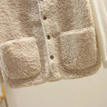 Women's ribbed knit button-up vest with relaxed fit detail
