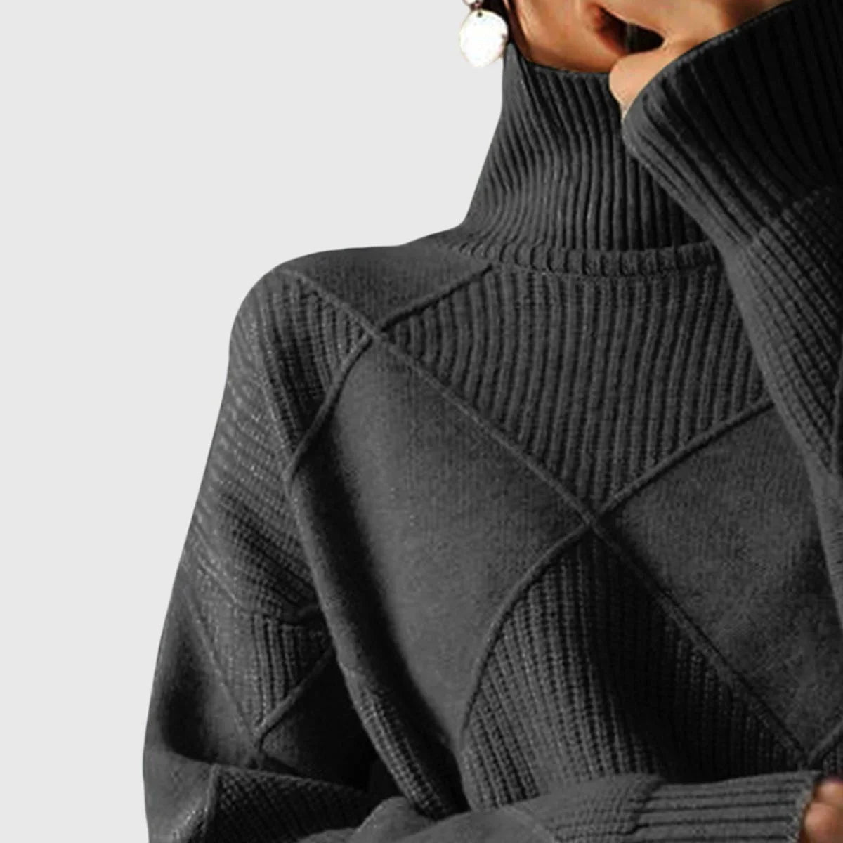 Women's ribbed knit turtleneck sweater with geometric pattern
