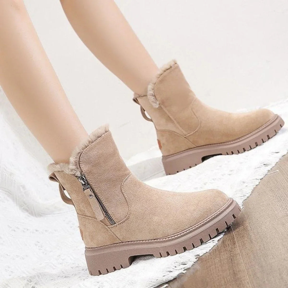 Women's suede slip-on ankle boots with fleece lining detail