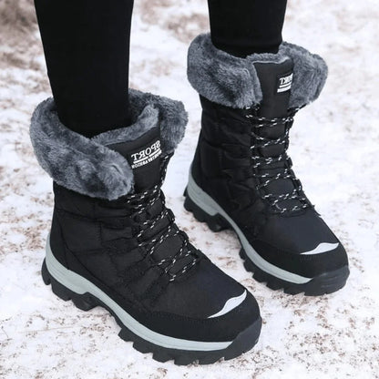 Women's lace-up winter boots with faux fur lining detail – Black