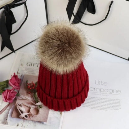 Women's cozy knit sweater-style beanie with faux fur pom – Claret