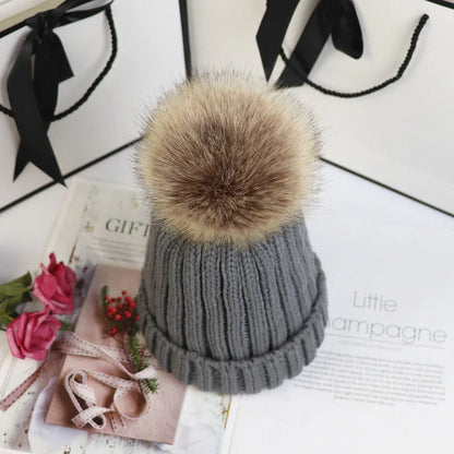 Women's cozy knit sweater-style beanie with faux fur pom – Dark Grey