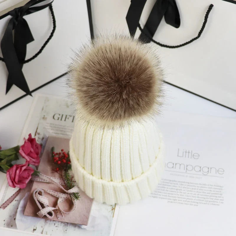 Women's cozy knit sweater-style beanie with faux fur pom – Milky White