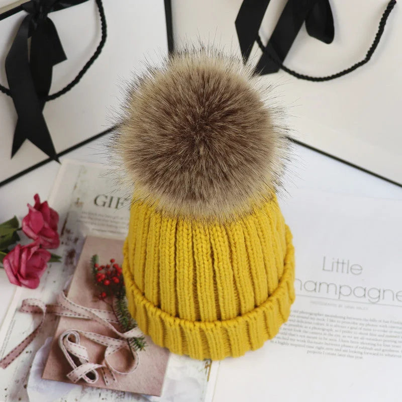 Women's cozy knit sweater-style beanie with faux fur pom – Yellow