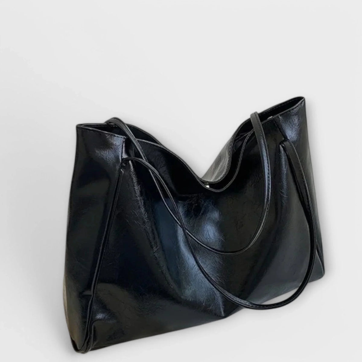 Women's faux-leather tote bag with open-top and thin straps