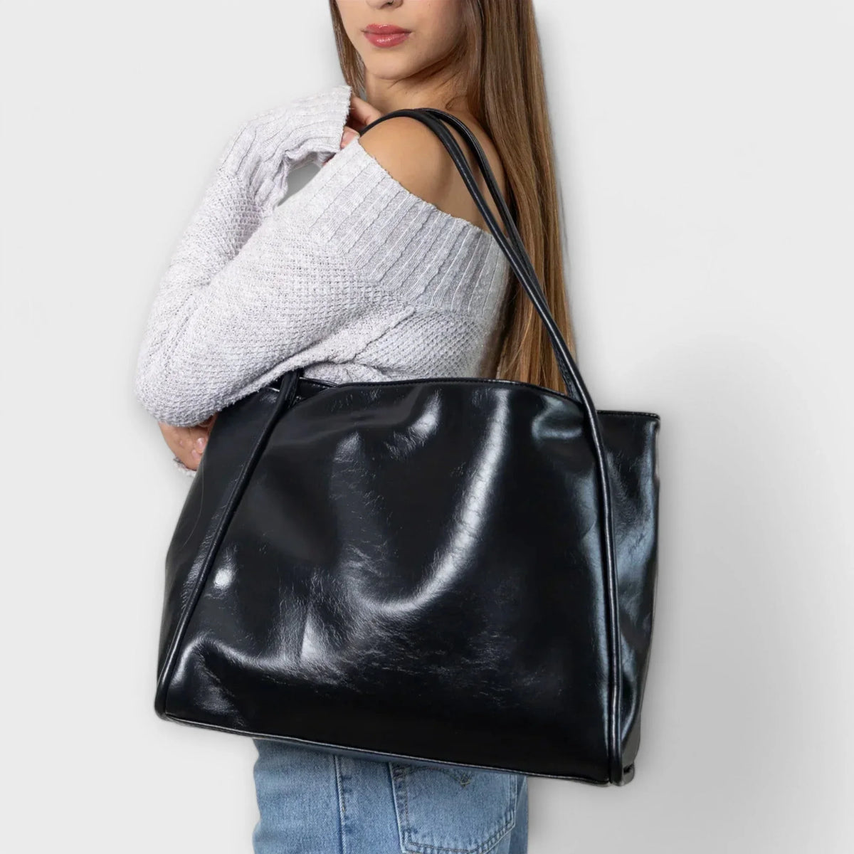 Women's faux-leather tote bag with open-top and thin straps
