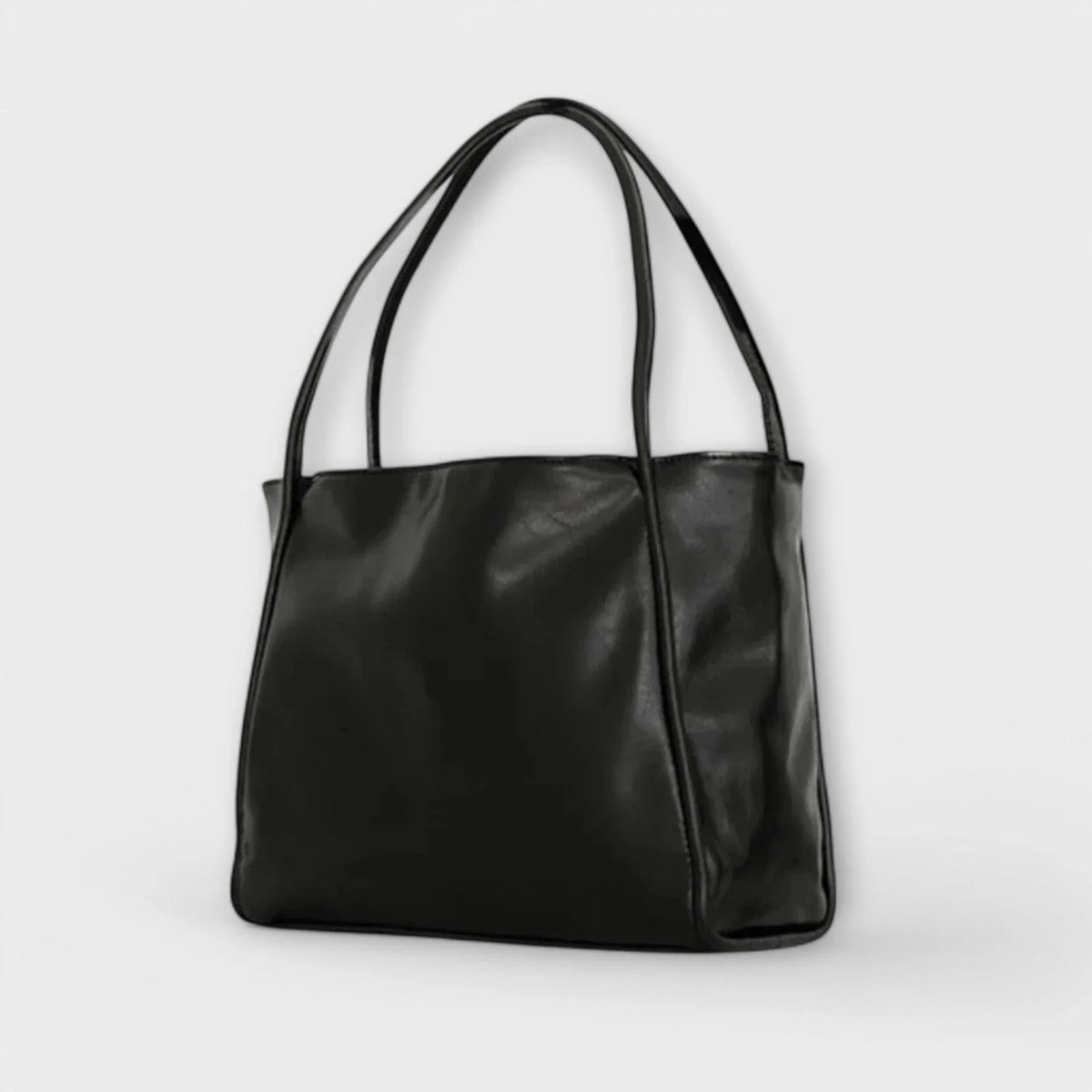 Women's faux-leather tote bag with open-top and thin straps