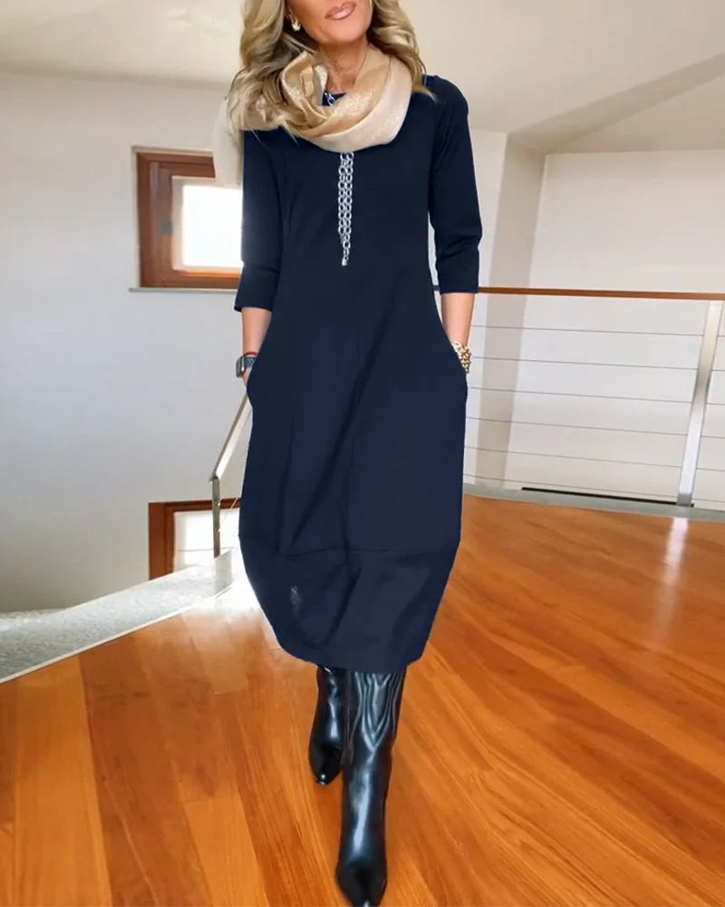 Women's knit 3/4-sleeve midi dress with round-neck and side pockets