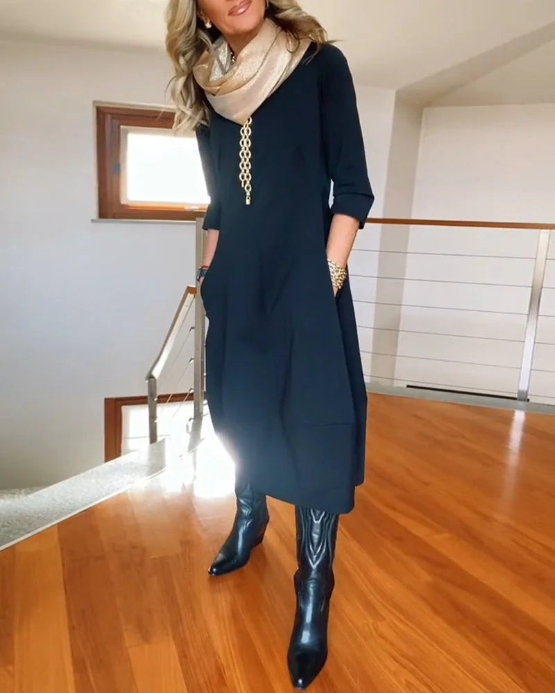 Women's knit 3/4-sleeve midi dress with round-neck and side pockets