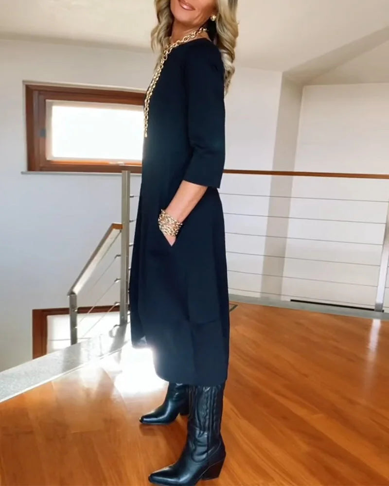Women's knit 3/4-sleeve midi dress with round-neck and side pockets
