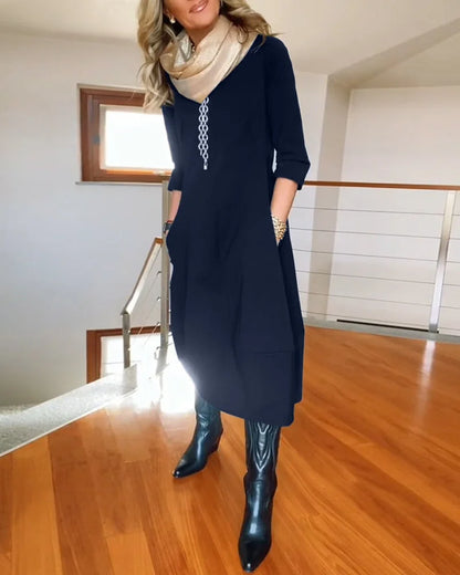 Women's knit 3/4-sleeve midi dress with round-neck and side pockets