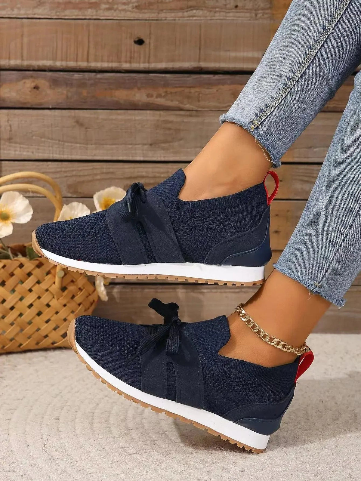 Women's knit slip-on sneakers with bow-knot laces and striped sides