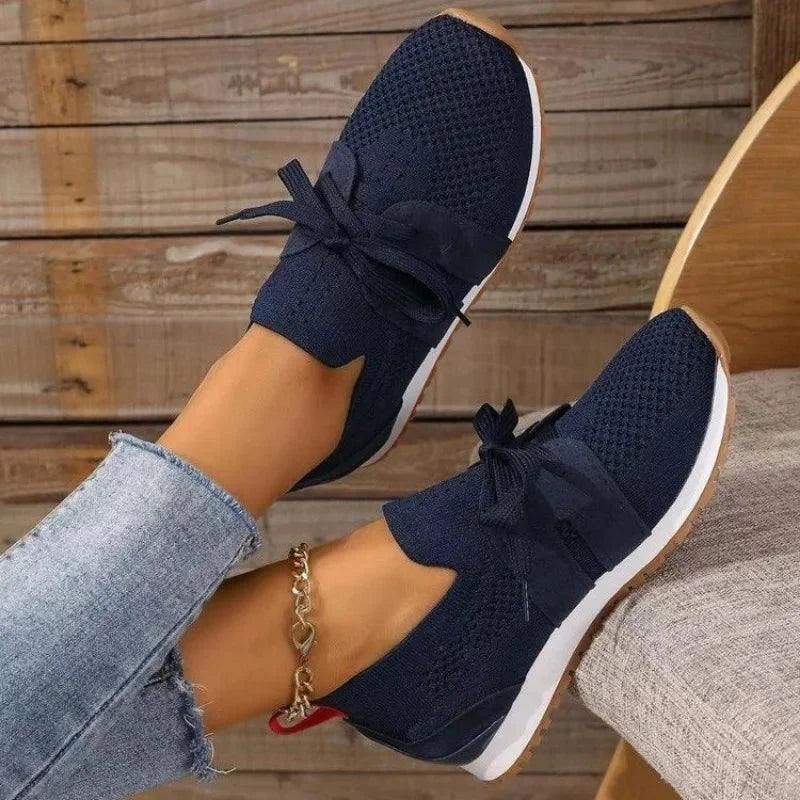 Women's knit slip-on sneakers with bow-knot laces and striped sides – Blue