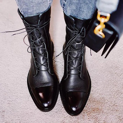 Women's leather heeled pointed-toe boots with lace-up cap-toe design