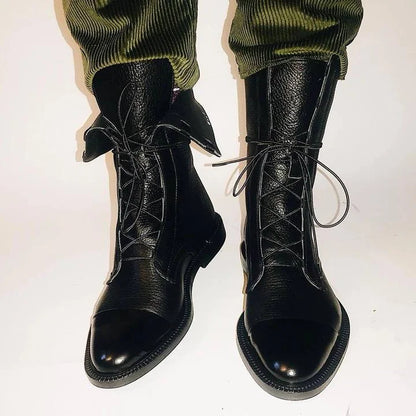 Women's leather heeled pointed-toe boots with lace-up cap-toe design
