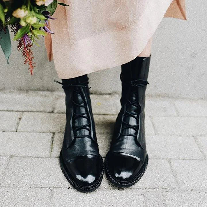 Women's leather heeled pointed-toe boots with lace-up cap-toe design – Black