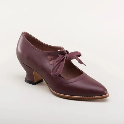 Women's leather Mary-Jane style pumps with cut-out lace-up ties