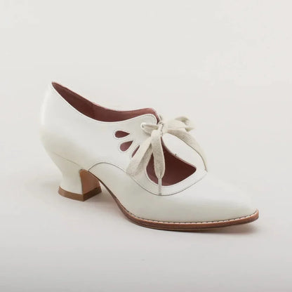 Women's leather Mary-Jane style pumps with cut-out lace-up ties