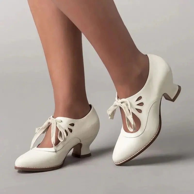 Women's leather Mary-Jane style pumps with cut-out lace-up ties – White