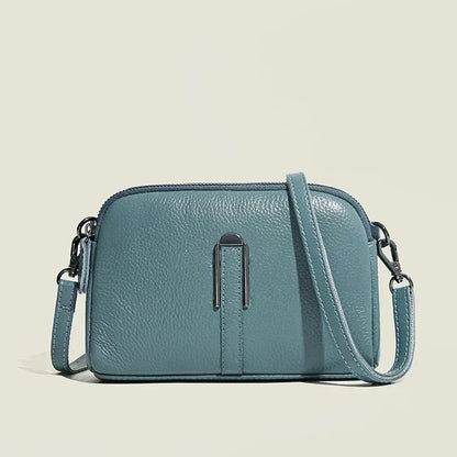 Women's leather shoulder bag with double zip closure and metal accent – Blue