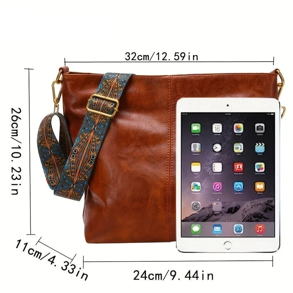 Women's faux-leather hobo bag with bohemian-patterned wide strap