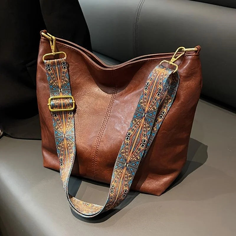 Women's faux-leather hobo bag with bohemian-patterned wide strap