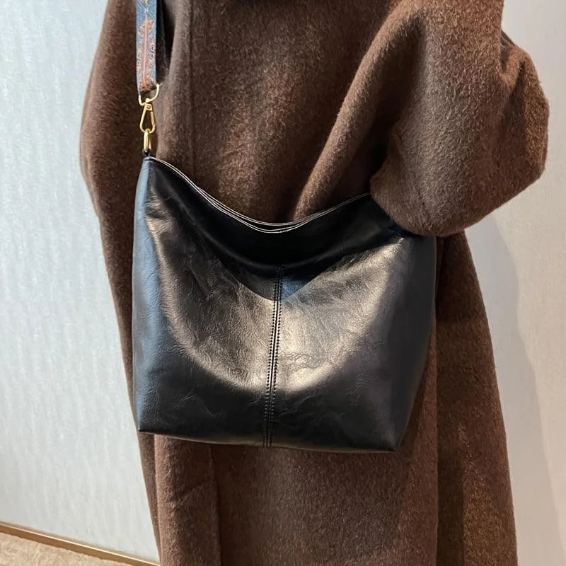 Women's faux-leather hobo bag with bohemian-patterned wide strap