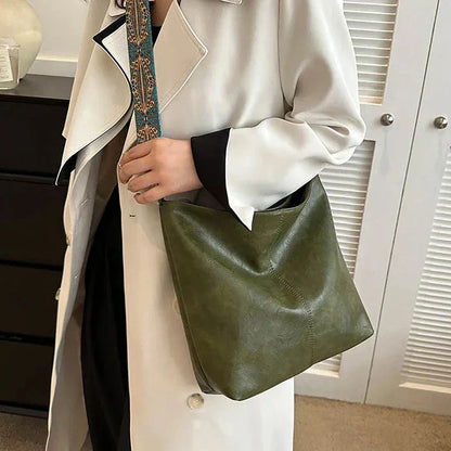 Women's faux-leather hobo bag with bohemian-patterned wide strap