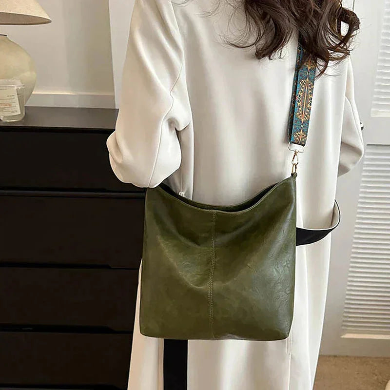 Women's faux-leather hobo bag with bohemian-patterned wide strap